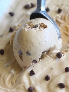 a scoop of ice cream with chocolate chips on top