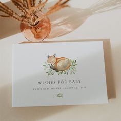 a card with an image of a fox on it and the words wishes for baby