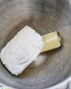 a piece of butter in a metal bowl