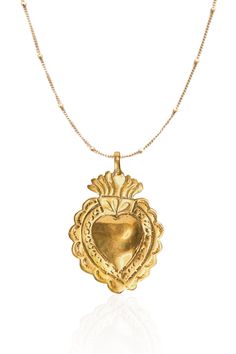 "The sacred heart is a religious symbol comprised of a flaming heart shining with divine light. The fire represents the transformative power of love.  Our heart is beautifully handcrafted hanging on a satellite chain.  DETAIL & SIZE Vermeil heart pendant 2\" high with 18K gold filled satellite chain.  Available in 16\" or 18\" This necklace is also available in sterling silver see other listing." Sacred Heart Pendant, Spiritual Brass Heart Pendant Necklace, Spiritual Medallion Necklace With Heart Charm, Spiritual Heart-shaped Brass Necklaces, Spiritual Medallion Necklace For Valentine's Day, Spiritual Heart-shaped Brass Necklace, Spiritual Necklace With Heart Charm, Spiritual Heart Charm Necklace, Sacred Heart Necklace