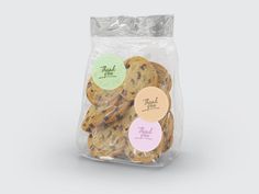 cookies in a plastic bag with labels on the front and back side, all packed together