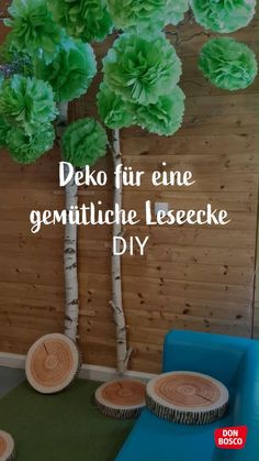 a wooden wall with green paper flowers on it and the words deko fureine gen