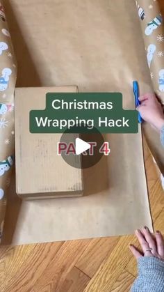 someone wrapping christmas presents in a box with the text, christmas wrapping hack part 4