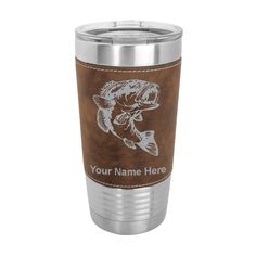 a stainless steel tumbler with a brown leather sleeve and fish on the side, that says your name here