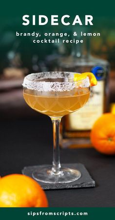 the sidecar cocktail is garnished with oranges