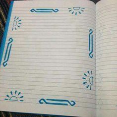 an open notebook with blue writing on it