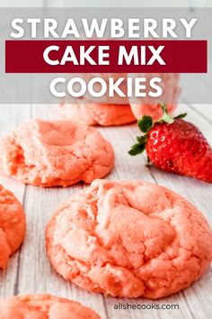 strawberry cake mix cookies on a table with strawberries