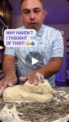 a man is kneading dough on top of a counter