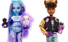 two dolls are shown side by side, one is wearing a costume and the other has a jacket