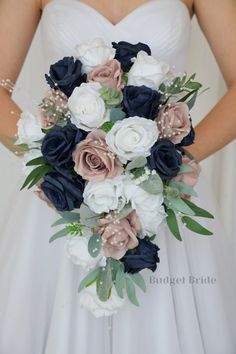 a bridal holding a bouquet of white and blue flowers