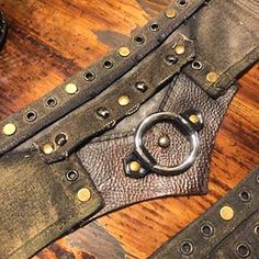 Gorgeous And One Of A Kind Piece! Handmade By The Designers At Royal Peasantry Boutique, This Belt Features A Center Ring, Studs And Leather Accents On A Canvas Base. Weathered And Worn To Look Straight Out Of A Mad Max Movie. Furiosa Would Have Loved This Belt. Belt Is Adjustable With Double Leather Straps To Tie In Back - Will Fit Most Sizes. Canvas Belt Is 22 Inches Long And 5 Inches Wide At Center. Perfect For Burning Man, Wasteland Weekend, A Furiosa Cosplay Or Your Next Festival! #Burningm Steampunk Belt Diy, Furiosa Cosplay, Moth Witch, Leather Pocket Belt, Mad Max Movie, Steampunk Belt, Max Movie, Macrame Belt, Leather Utility Belt