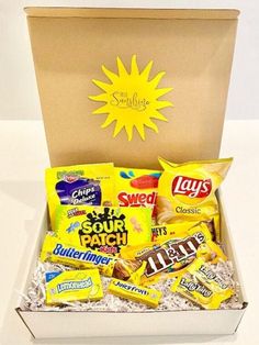 a box filled with lots of different types of snacks