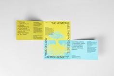 two brochures with yellow and blue designs on the front one has an image of a tree