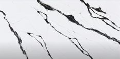 black and white marble textured wallpaper with dark streaks on the top right side