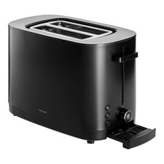 a black toaster sitting on top of a white table