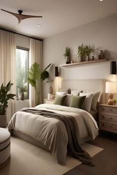 a bedroom with a large bed and plants on the wall