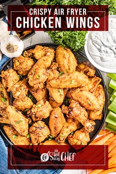 crispy air fryer chicken wings on a plate with celery and carrots