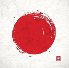 a red circle painted on white paper with chinese characters