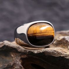 Vikings Jewelry-Simple Vintage Tiger Eye Brown Stone Rings For Men Women Stainless Steel Punk Biker Fashion Party Jewelry Gifts Surface Width: 17mm Style 5: Wedding Custom Jewelry Style 4: Party Jewelry Gift Style 3: Fashion Jewelry Style 2: Stone Ring Style: Punk Style: Stainless Steel Ring Shape\pattern: Geometric Rings Type: Cocktail Ring Ring Size: 7,8,9,10,11,12,13 Other Style: Fashion, Cool, Vintage, Biker, Viking, Nordic Origin: 3256805253922373 Occasion: Wedding, Anniversary, Engagement, Vikings Jewelry, Stone Rings For Men, Biker Fashion, Geometric Rings, Cats Eye Ring, Brown Tiger, Vintage Tiger, Brown Tiger Eye, Metallic Party