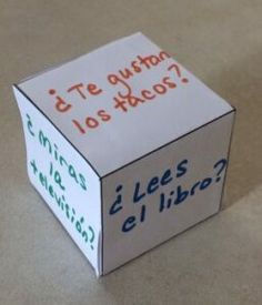 a cardboard box with spanish words written on it