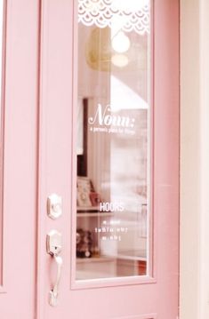 a pink door with the words mom on it