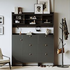 a living room with a large bookcase and some pictures on the wall above it