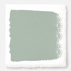 a gray paint swatch on a white background