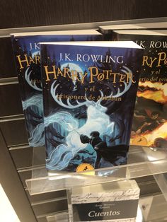 two harry potter books on display in a store