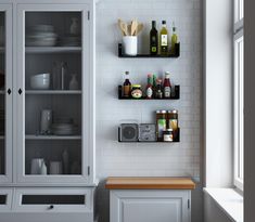 the shelves in the kitchen are filled with bottles