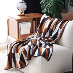 Elevate your home decor with this Modern Geometric Throw Blanket. Featuring a sophisticated color palette of mauve, black, and cream in a striking angular pattern, this throw is both bold and elegant. Crafted with care, it adds a layer of style and comfort to any space, perfect for contemporary and minimalist interiors.• Geometric Design: Eye-catching pattern with sharp, angular lines.• Soft & Cozy: Made from quality fabric for warmth and comfort.• Stylish Accent: Complements modern and minimali Area Rugs Dining Room, Modern Throw Blanket, Dining Room Area Rug, Sophisticated Color Palette, Bedspreads Comforters, Office Area Rugs, Rug Runner Kitchen, Bedroom Area Rug, Rug Dining Room