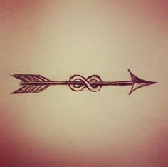 an arrow tattoo on the wall