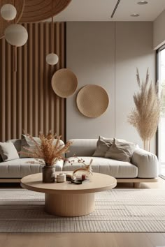 a living room filled with lots of furniture next to a tall wall mounted planter