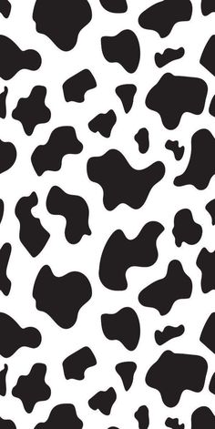 a black and white animal print pattern that looks like it has spots on the skin