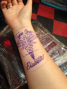 a woman's arm with a tattoo on it that says type one diabetite