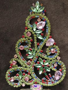 a christmas tree made out of beads and jewels