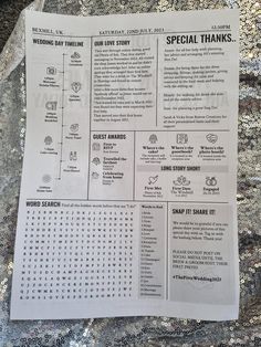 a sheet of paper sitting on top of a table covered in words and numbers,