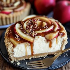 a slice of cheesecake with caramel topping on a plate next to an apple