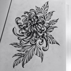 a black and white drawing of a flower