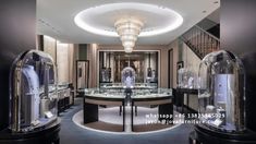 the inside of a jewelry store with glass cases