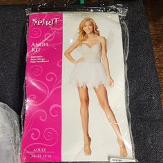 the package is packaged in plastic and has an angel costume on it