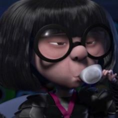 a cartoon character with glasses blowing a bubble into her mouth and looking at the camera