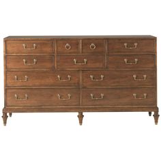 a large wooden dresser with many drawers