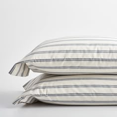 two pillows stacked on top of each other