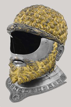 the helmet is made out of metal and has a yellow beard