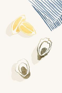 three pieces of fruit sitting next to each other on a white tablecloth with blue and white stripes