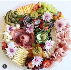 a platter filled with lots of different types of food