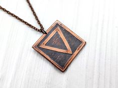 This alchemy symbol pendant is made from pure, hand-forged copper. Alchemical symbols were used to denote the elements until the 18th century. DETAILS: - This pendant is already made and ready to ship - Jute bag included. Great gift package. - Ships with tracking number within 1 business days once ordered! - It will come wrapped in paper box Also you can choose wooden box as additional gift package ABOUT WATER SYMBOL Water is the element of emotion and the unconscious, as opposed to the consciou Alchemical Symbols, Necklace Magic, Citrine Crystal Necklace, Witchy Necklace, Water Symbol, Alchemic Symbols, Alchemy Symbols, Raw Crystal Jewelry, About Water