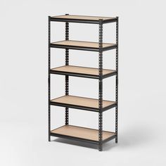 an empty shelving unit with four shelves on one side and three shelves on the other