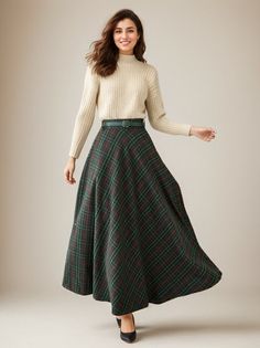 This winter wool skirt is a classic piece of tailoring that will see you through rain or shine. It is cut with a flattering flared skirt to give you a wonderful shape. The winter skirt is perfect classic styling and ends at the ankle. This is a versatile skirt that you'll wear again and again. DETAILS: * 30% wool, 30% fiber, 40% polyester * Fully satiny liner * Two side pockets * Right zip closure * Has belt loops to keep everything in place * Elastic band at the back to provide some stretch * Plus size full skirt * Ankle length skirt * Perfect for Winter, autumn * Dry clean * Lean More about the items From the FAQs on the page bottom * More plaid skirt  https://etsy.me/2WTMplo * The model is 170cm (5′7″) tall with a 80cm (31.5") bust, 66cm (26") waist. She is wearing the green plaid dress Classic Plaid Skirt For Fall, Plaid Full Skirt For Work, Wool Long Skirt For Fall, Long Plaid Skirt For Fall, Plaid Long Skirt For Fall, Elegant Plaid Winter Skirt, Fall Wool Long Skirt, Fall Plaid Long Skirt, Wool Full Skirt For Fall