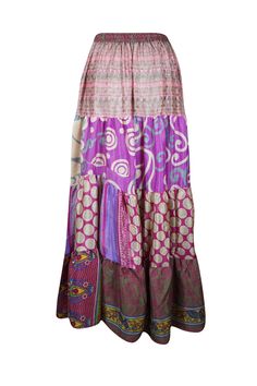 Embrace your free-spirited side with our Boho Chic Maxi Skirt, designed for the modern soul who loves to blend Light Purple Floral comfort and style. This flowing, maxi-length skirt features vintage-inspired tribal prints and earthy tones, perfect for creating a laid-back yet hippie-style look. Handcrafted with care, the skirt boasts tiered layers and subtle, giving it a graceful, gypsy flair. Whether you're strolling on the beach or attending a festival, this relaxed-fit statement skirt will fl Chic Maxi Skirt, Skirt Patchwork, Beach Maxi Skirt, Statement Skirt, Floral Maxi Skirt, Boho Skirts, Free Spirited, Hippie Style, Earthy Tones